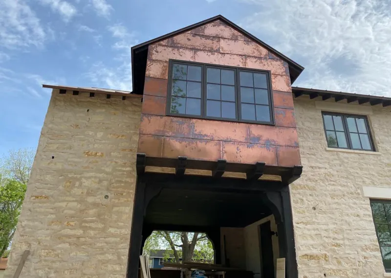 Copper metal panel facade on a stone building for Metal Roof Coating in Sleepy Hollow